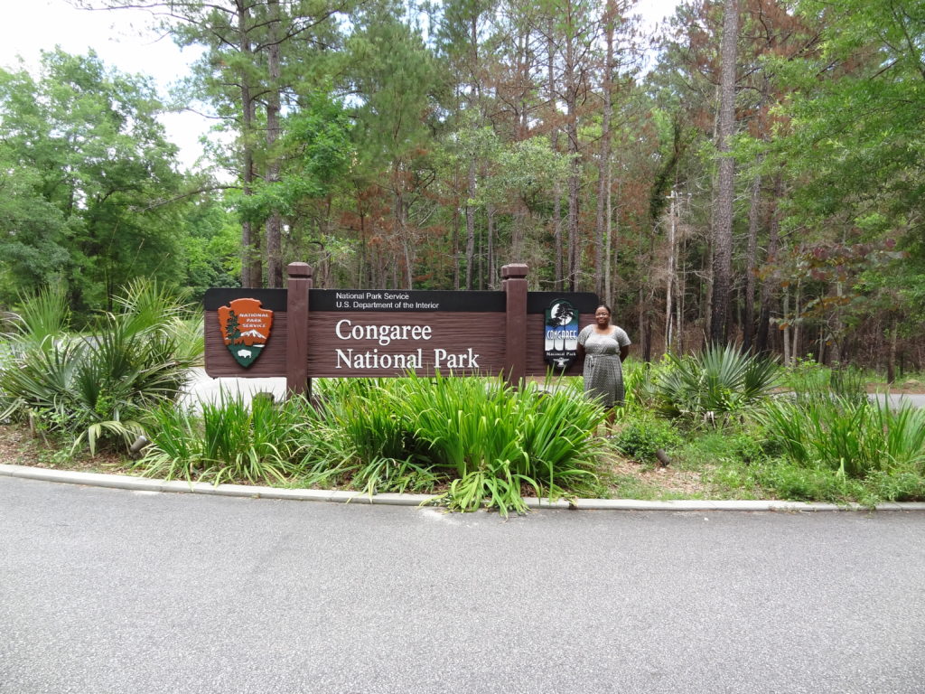 Congaree National Park Sign with woman in a dress