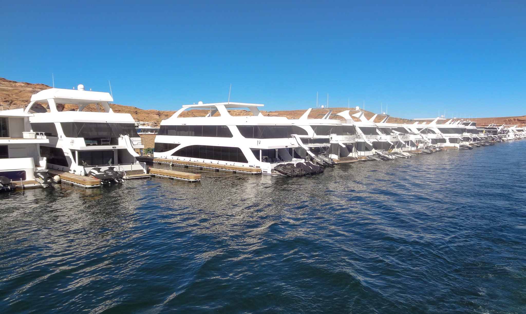 Nice house boats that you pass in Wahweap Marina on the Rainbow Bridge Tour!