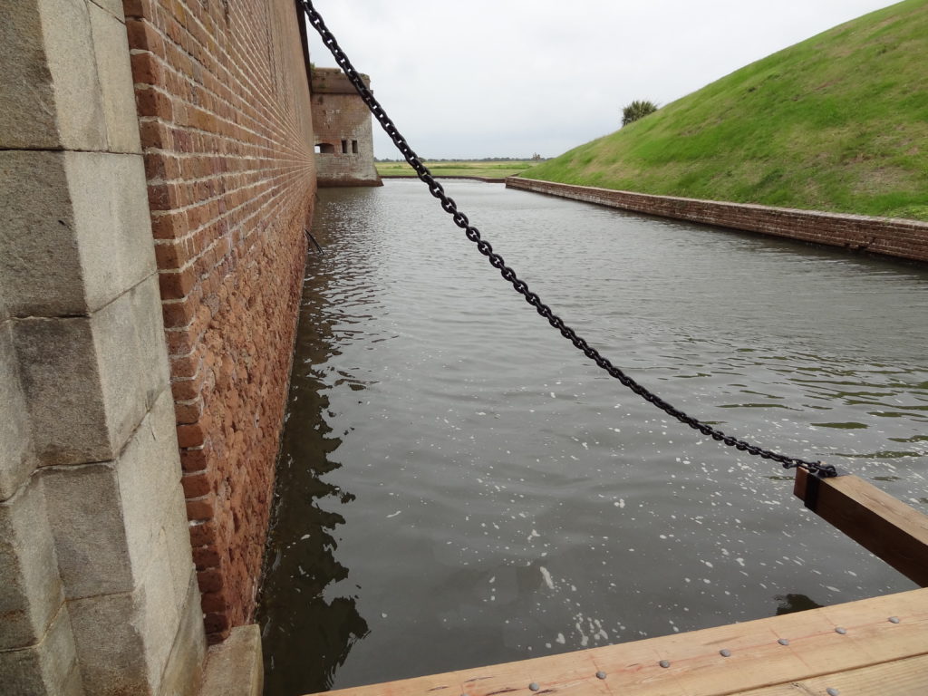 A moat surrounds Fort Pulaski, a National Park Service site located not far from Savannah, GA.  This is a great site to visit when you are in the Lowcountry, and one of the many things to do in Savannah, GA.